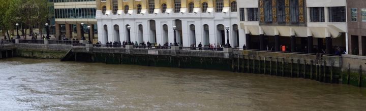 People queuing on the riverside outside London Bridge hospital.